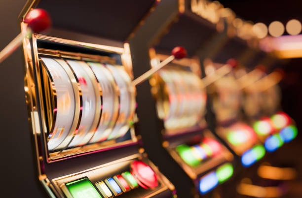 Mobile app on phone showing live dealer tables